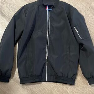 Black Bomber Jacket with Ribbed Trim and Minimalist Design New No Tags